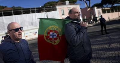 Agentes das forças de segurança em protesto, por melhores condições salariais e de trabalho, durante o render solene da guarda junto ao Palácio de Belém, em Lisboa.