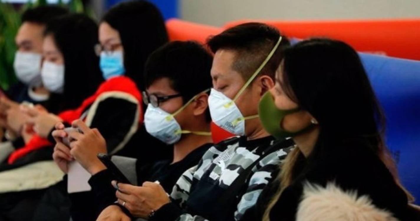Covid-19: Várias cidades da China relaxam medidas de prevenção epidémica