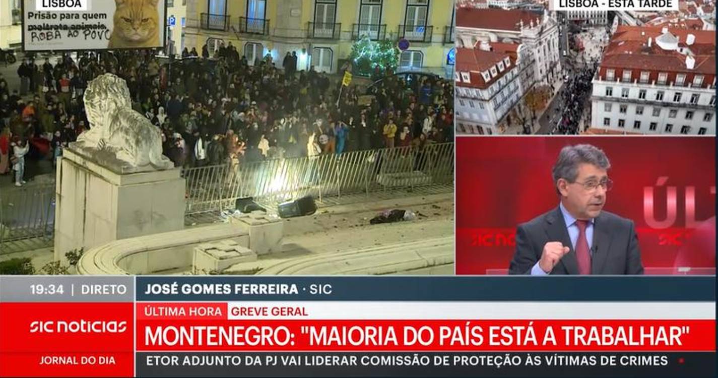 Manifestantes concentrados junto ao Parlamento atiram garrafas e caixotes do lixo
