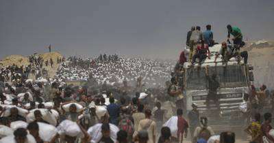 Distribuição de comida na Faixa de Gaza.