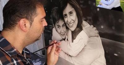 Pintura ao vivo de Dinarte Sousa no Mercadinho de Natal de Machico