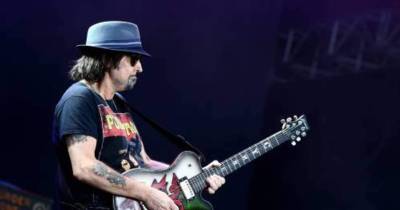 epa04861142 Guitarist Phil Campbell of British rock group Motorhead performs on stage during the 2015 Ansan M Valley Rock Festival on Daebudo-Island in Ansan, South Korea, 26 July 2015. The music event runs from 24 to 26 July. EPA/JEON HEON-KYUN