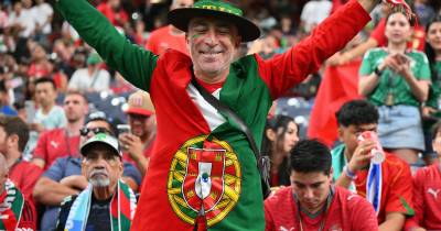 epa13044586 Supporters of Portugal pose for a picture prior to the FIFA World Cup 2026 group stage match Portugal against Democratic Republic of Congo, in Houston, USA, 17 June 2026. EPA/SAM WASSON