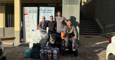 Equipa de rali com donativo à Associação Portuguesa das Pessoas com Necessidades Especiais - Associação Sem Limites.